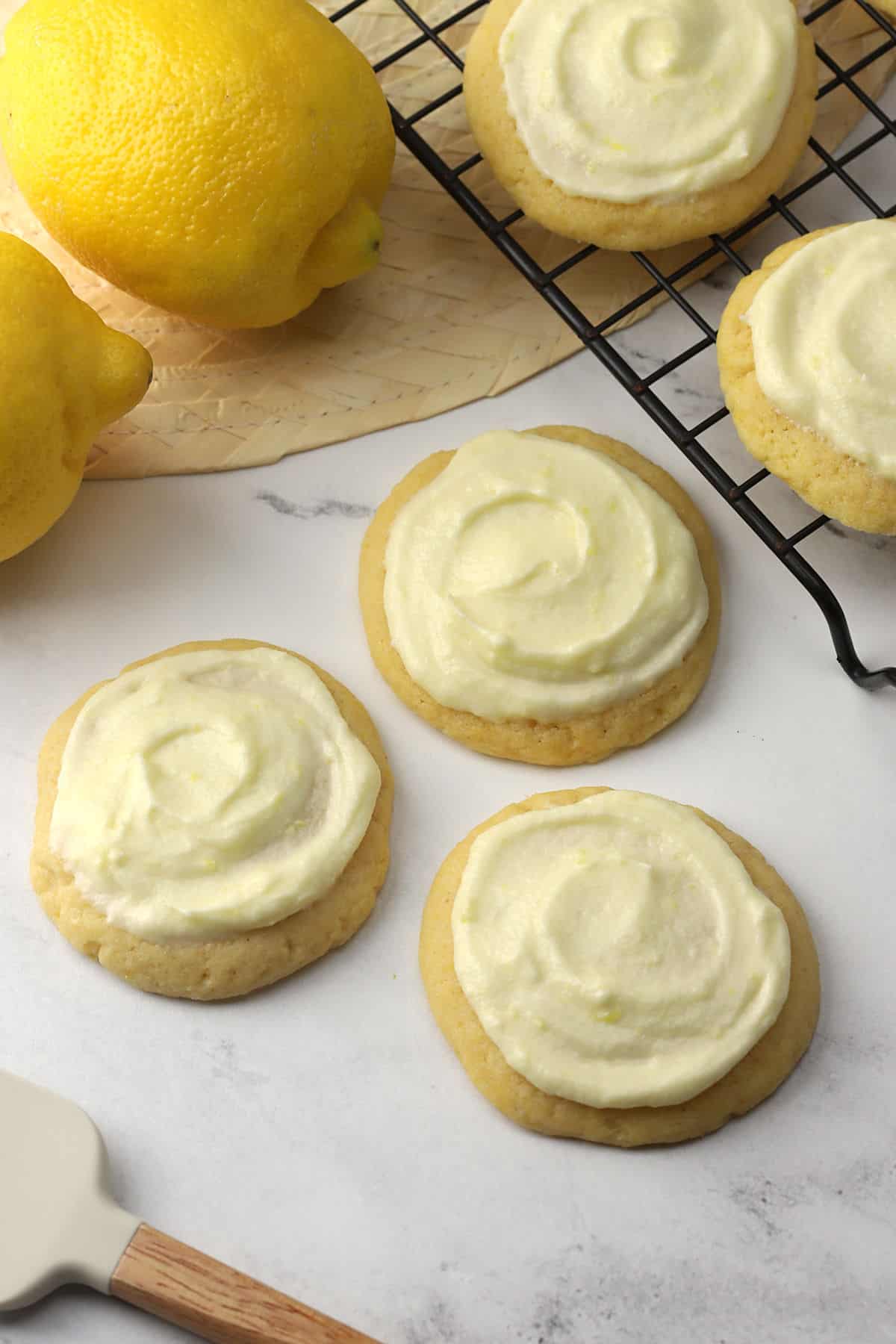 Cookies displayed near a cooling rack.