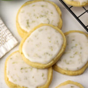 Lime shortbread cookies on a marble counter top.