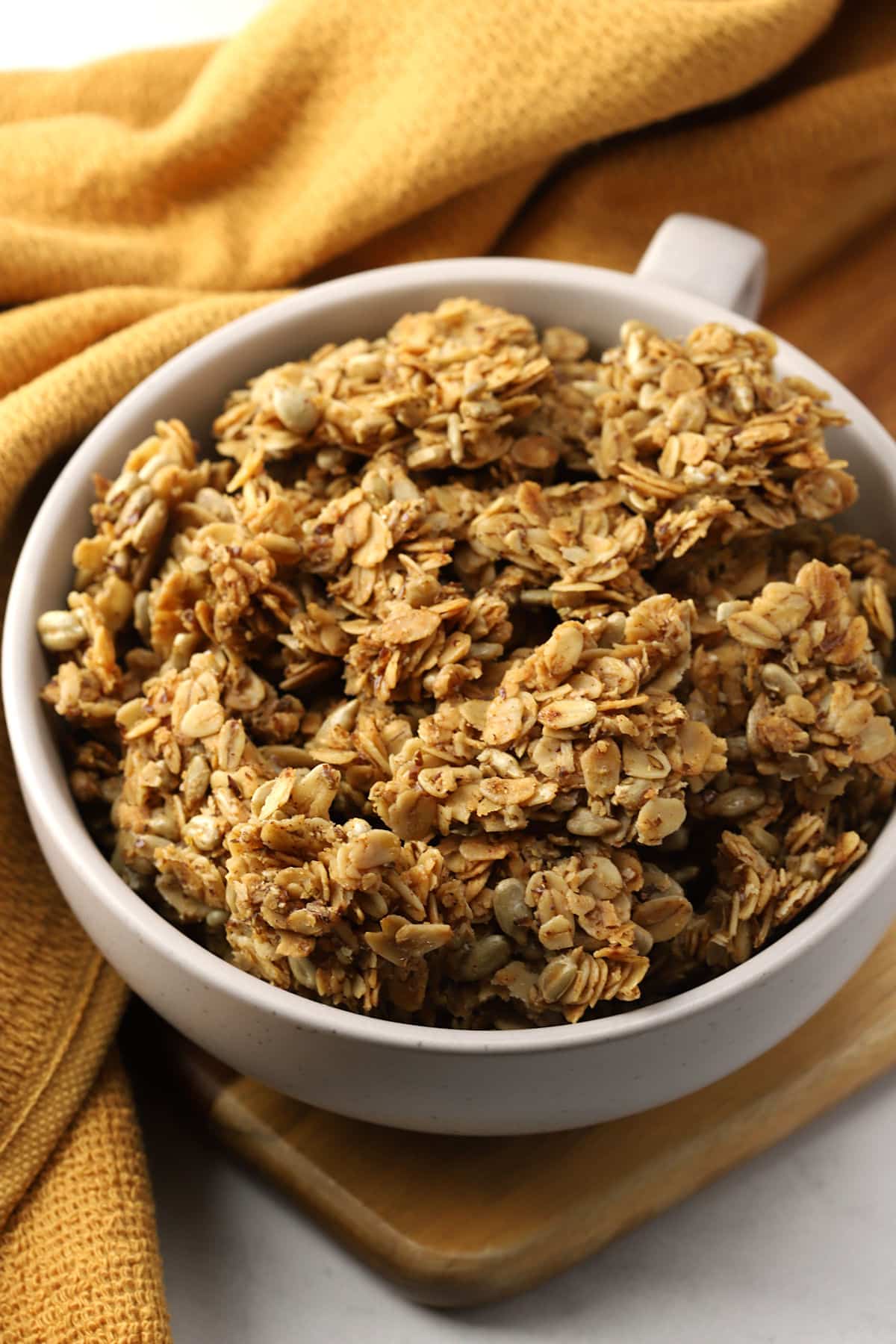 Granola in a round bowl.