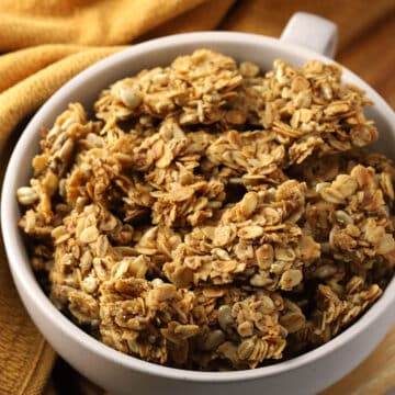 Granola in a round bowl.