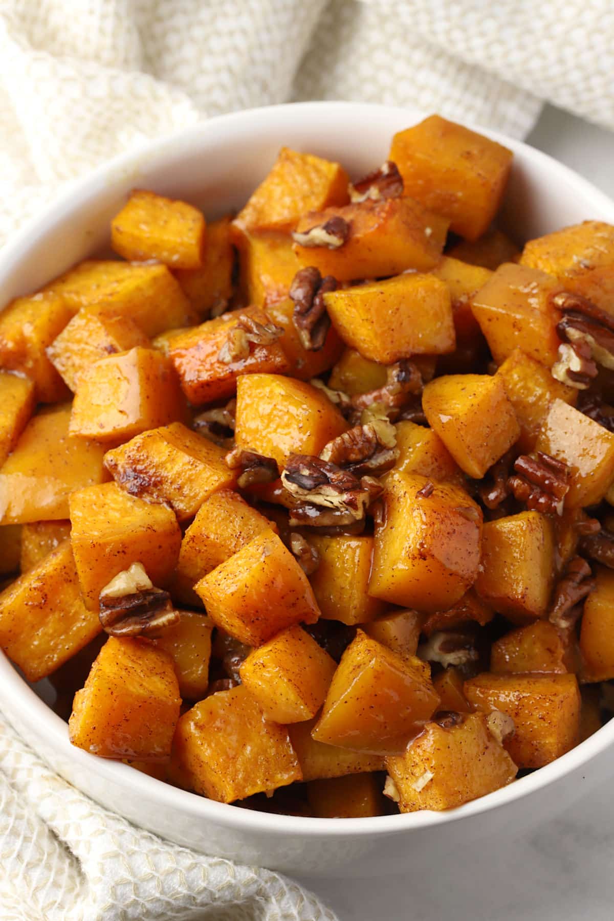 Roasted butternut squash in a bowl.