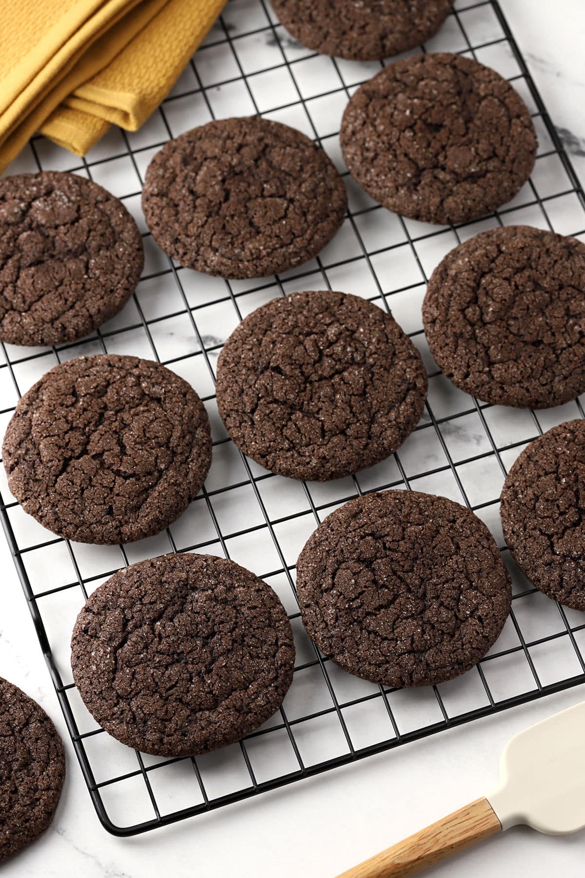 Dutch cocoa cookies on a cooling rack.