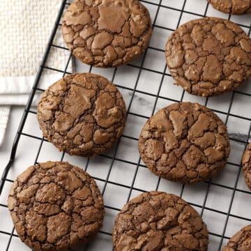 Buckwheat brownie cookies on a cooling rack.