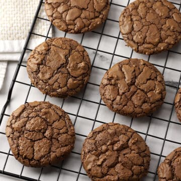 Buckwheat brownie cookies on a cooling rack.