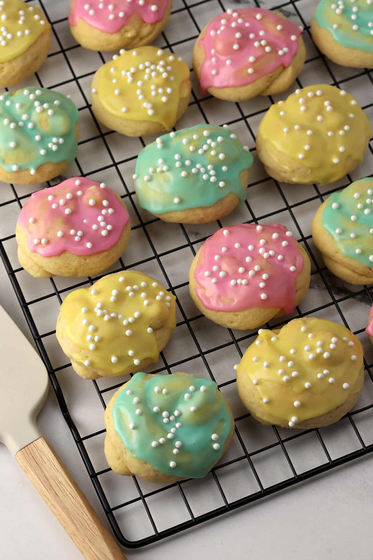 Italian easter cookies on a cooling rack.