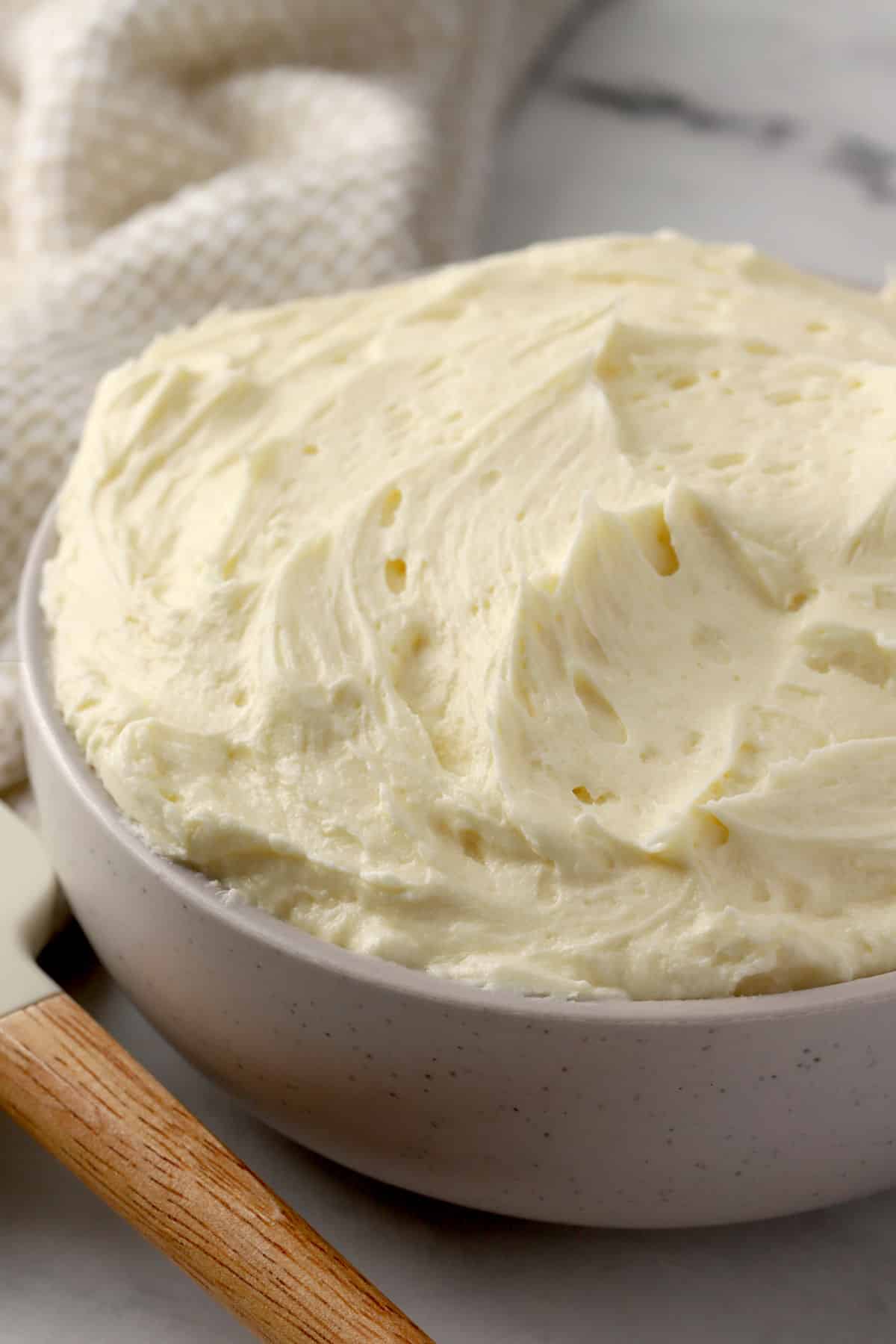 A large bowl of buttermilk frosting.