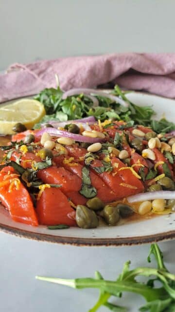 Cuts of salmon with an herbaceous dressing.