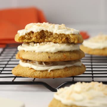 Stack of carrot cake cookies on a cooling rack.
