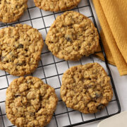 Oatmeal cookies cooling on a rack.