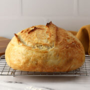 Overnight no knead bread on a cooling rack.