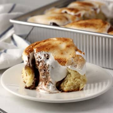 S'mores cinnamon roll on a plate.