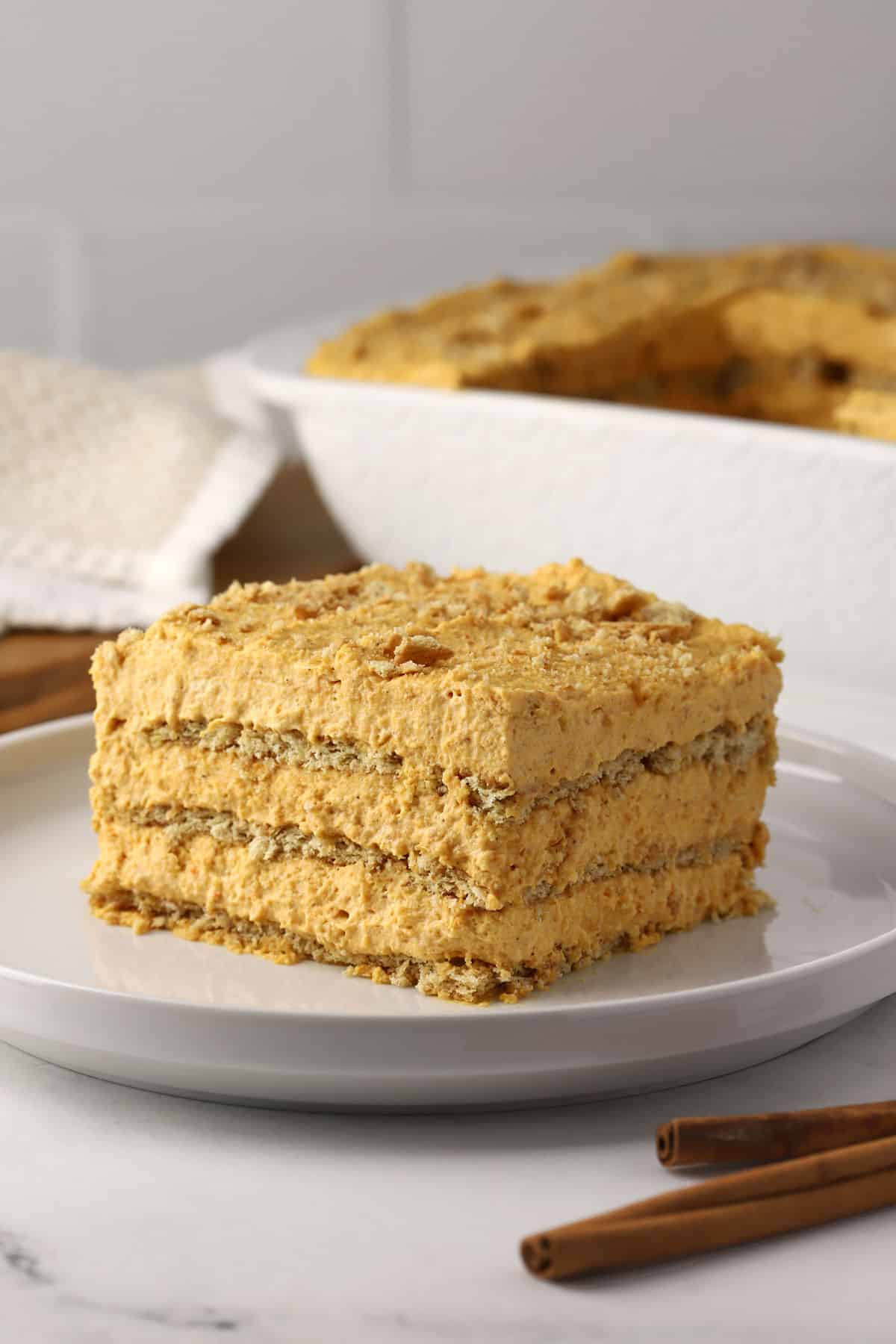 A slice of pumpkin icebox cake on a plate.